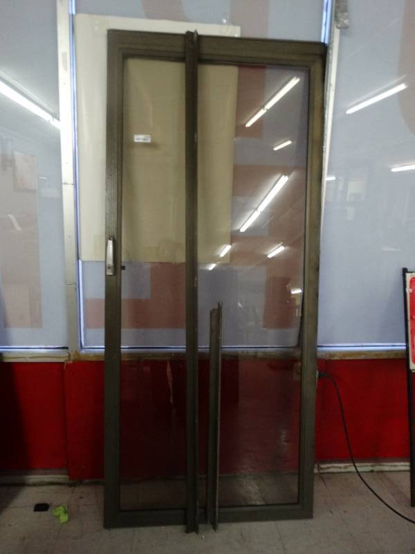 lot 1429 image: Glass Storm door 81 12 x 35 12 