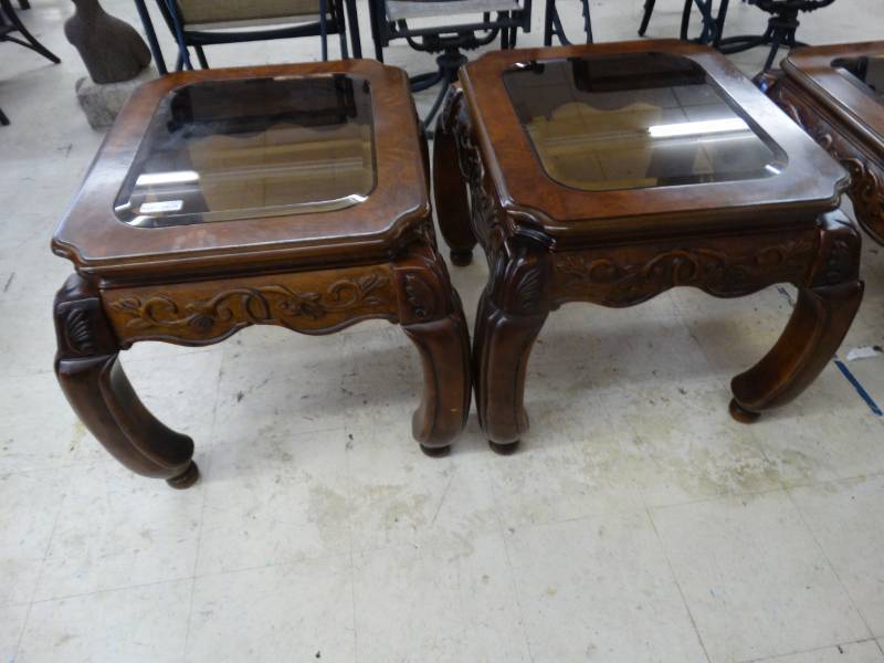 lot 1453 image: Pair of Beautiful dark carved wood end tables w beveled glass tops-