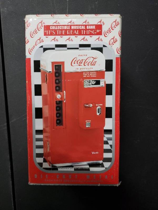 lot 9364 image: Coca Cola Die Cast Metal Bank