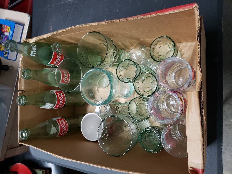 lot 9376 image: Coca Cola Bottles and Glasses