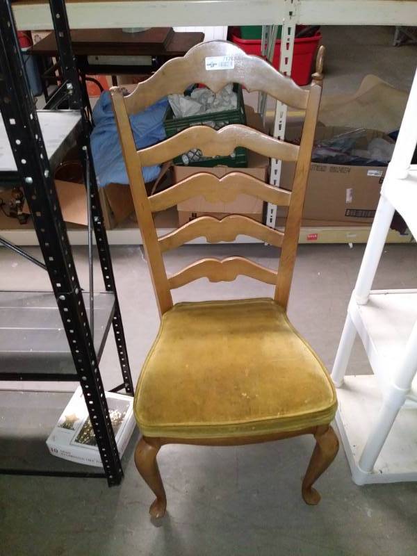 lot 7176 image: Wooden chair with cushioned seat.