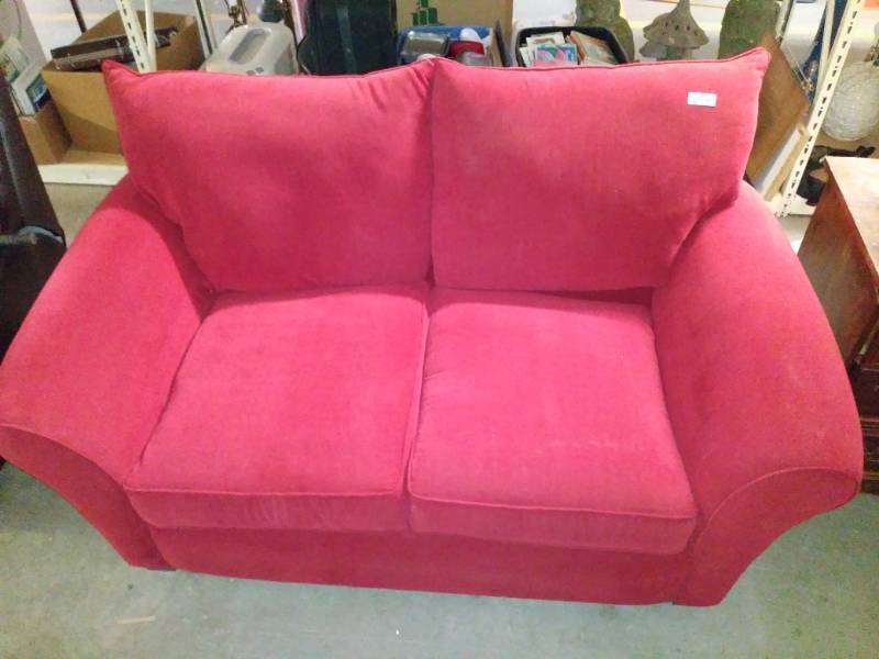 lot 7179 image: Allen White RED love seat. Excellent condition