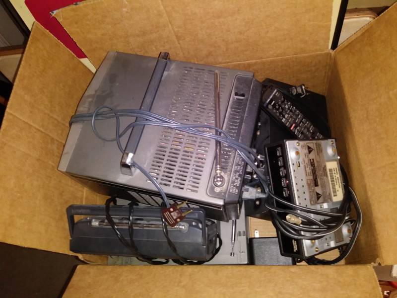 lot 7215 image: Lot of various portable and electric televisions AMFM radios.
