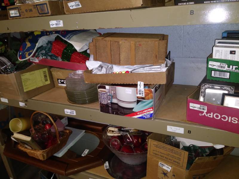 lot 7240 image: Lot of Christmas decor, glass canisters, christmas cup, books and more.