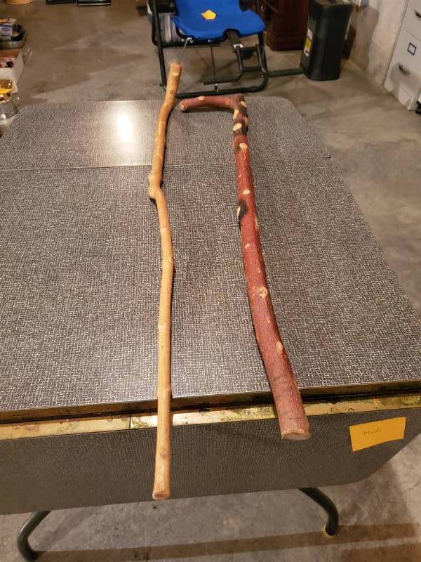lot 122 image: Two Hand Hewn Walking Sticks  Canes