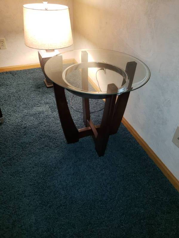 lot 7416 image: Wood based side table with glass top.