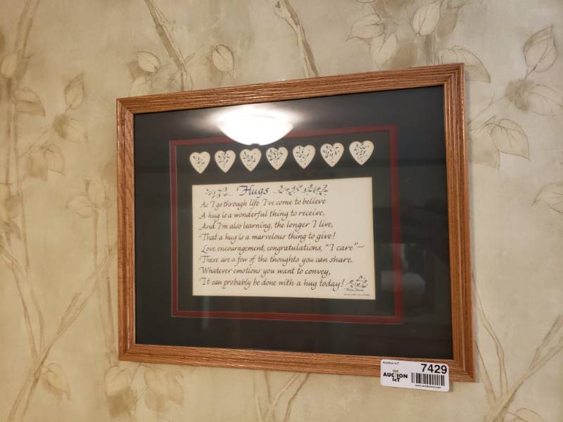 lot 7429 image: Hug poem wall art.