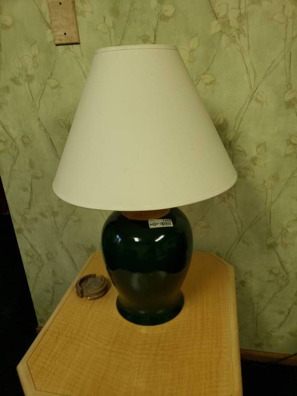 lot 7449 image: Lamp and coaster set with holder.