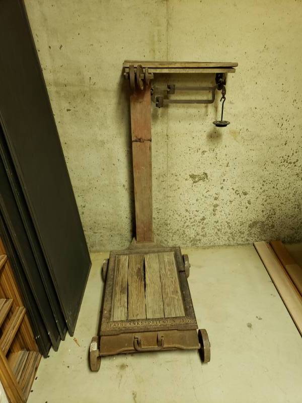 lot 7471 image: Antique Fairbanks scale on wheels.