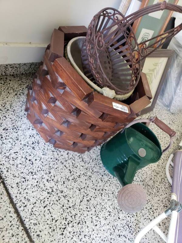 lot 7517 image: 2 Planters, metal basket and lawn chair and watering can.