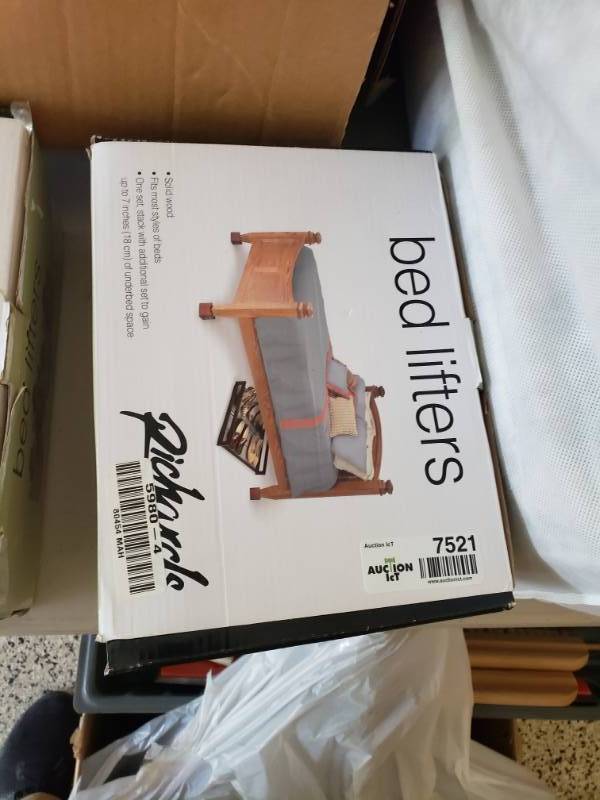 lot 7521 image: Set of 4 solid wood bed lifters