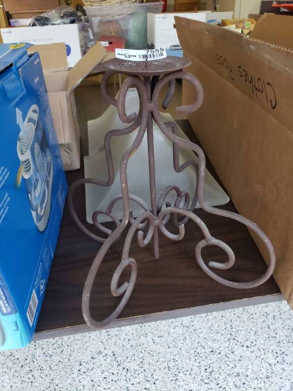 lot 7555 image: Decorative metal candle holder