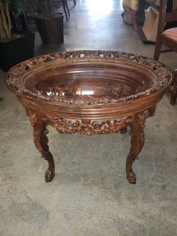 lot 7552 image: Solid Walnut Hand Carved Aqua-man Oval Table