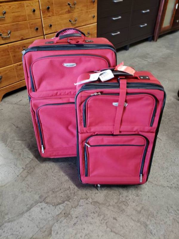 lot 7655 image: Set of 2 Matching Red Performance Luggage on Wheels