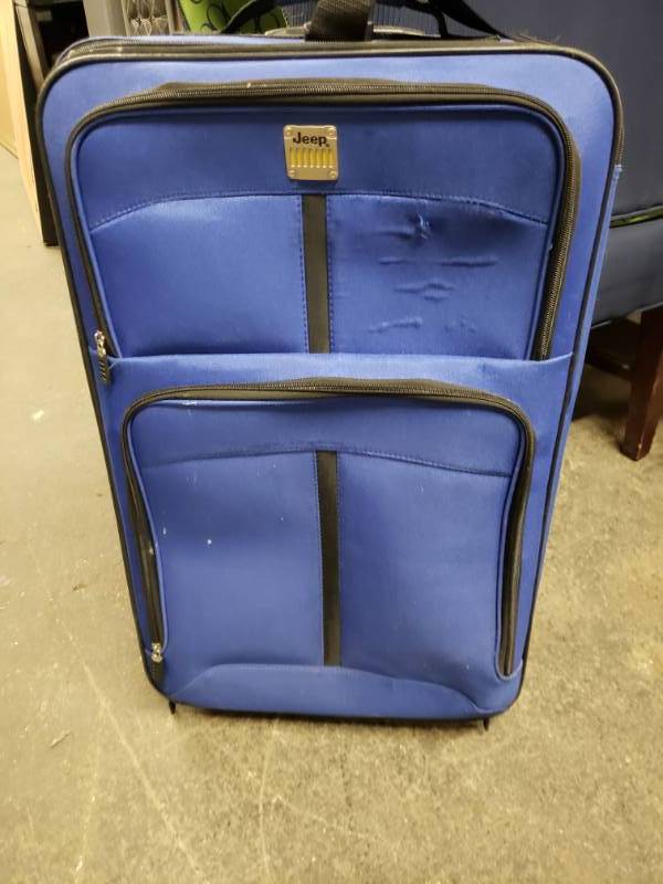 lot 1721 image: Blue Jeep Rolling Suitcase