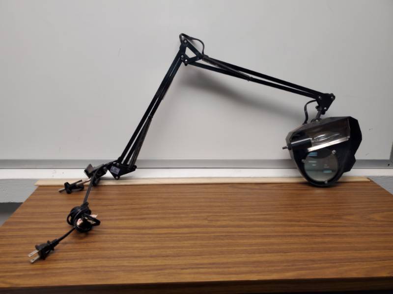 lot 2943 image: Articulating Clamp On Light With Magnifier