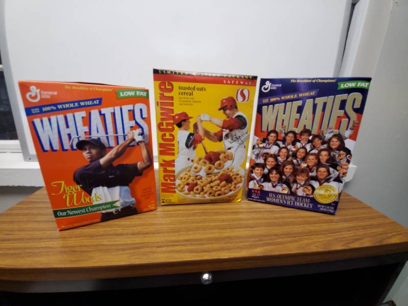 lot 2973 image: 2-Unopened Wheaties Boxes from the 90s Featuring  Tiger Woods USA Hockey  AND 1  Toasty Oats- Mark Mcgwire