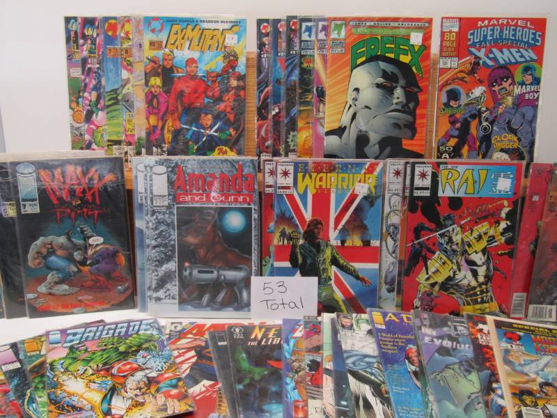 lot 2987 image: Huge Lot of 53 Comic Books-  VALIENT-MALIBU and Other