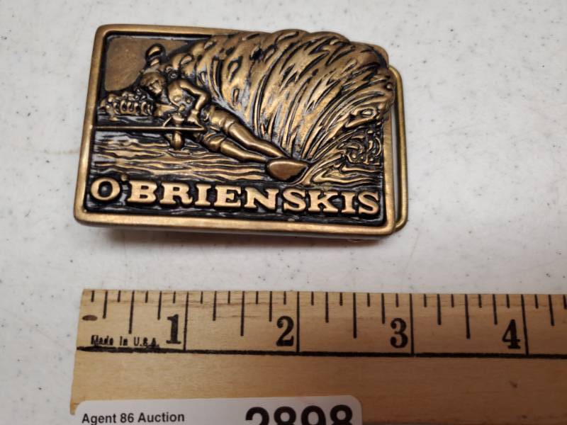 lot 2898 image: Cool and Vintage O Brian Skis Brass belt Buckle- Waterskier