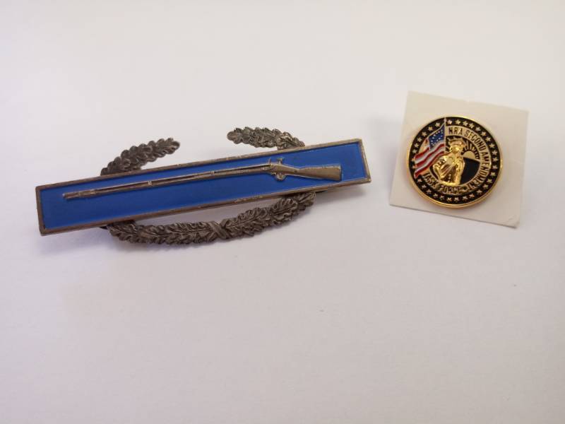 lot 37 image: WWII Combat Infantryman Sterling Silver Badge  Bonus NRA Pin