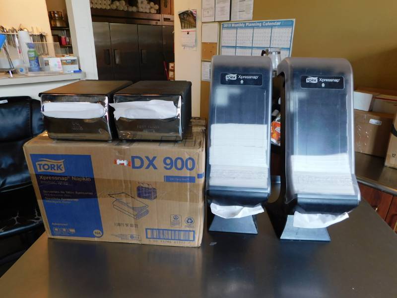 lot 3279 image: 2 Large Tork Xpressnap Dispensers, 2 Table Top Dispensers and 1 Case of Napkins