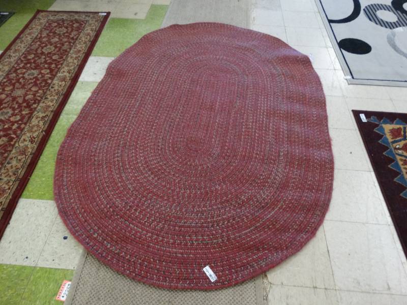 lot 7760 image: New Red Oval Rug