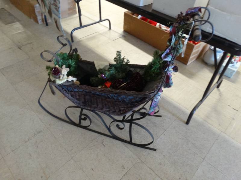 lot 7767 image: Wicker and Metal Santa Sleigh and Santa  Blanket