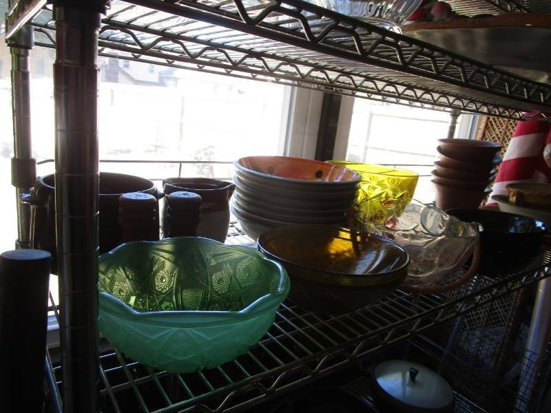 lot 16177 image: Colored Glass  Stoneware Bowls on Shelf