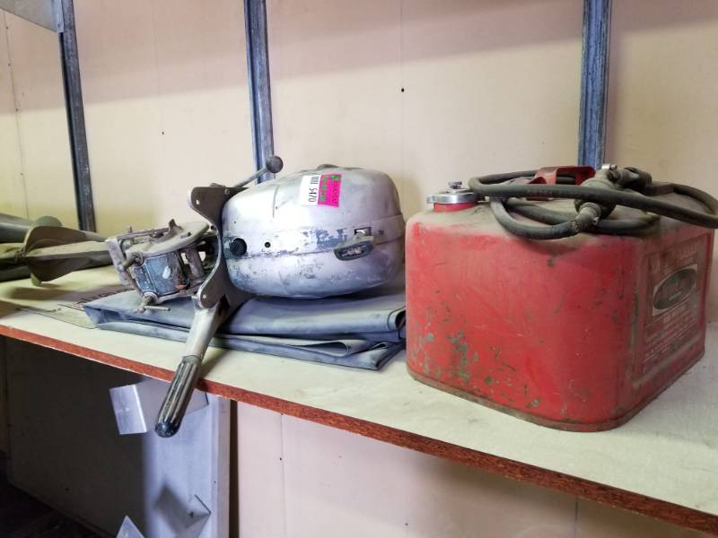 lot 5470 image: Boat Motor and Gas Can