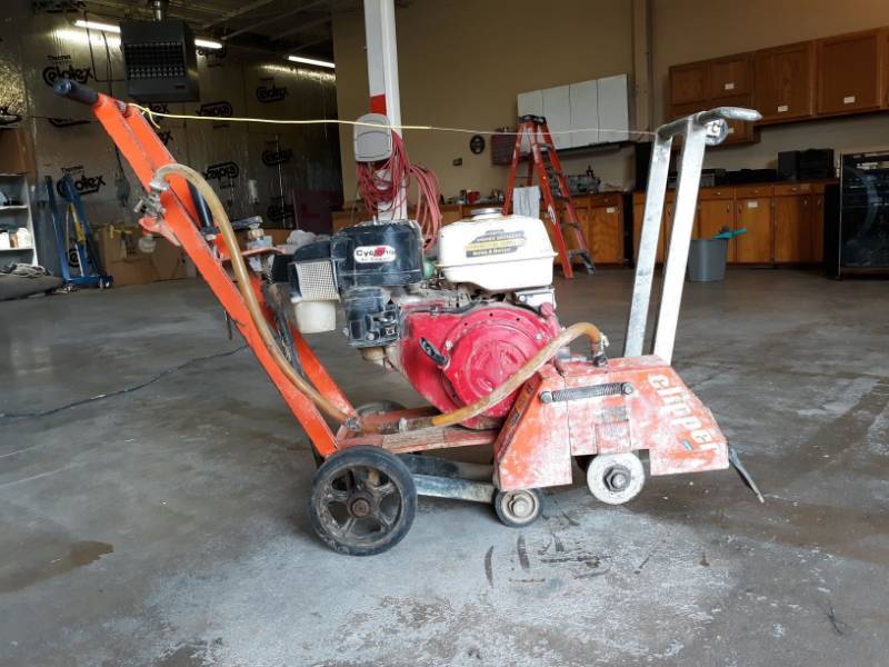 lot 9765 image: Walk Behind Gas Powered Concrete Saw Model C-111