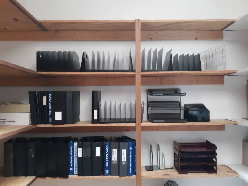 lot 9863 image: Assorted Three Ring Binders, Documents Trays, And Bookends