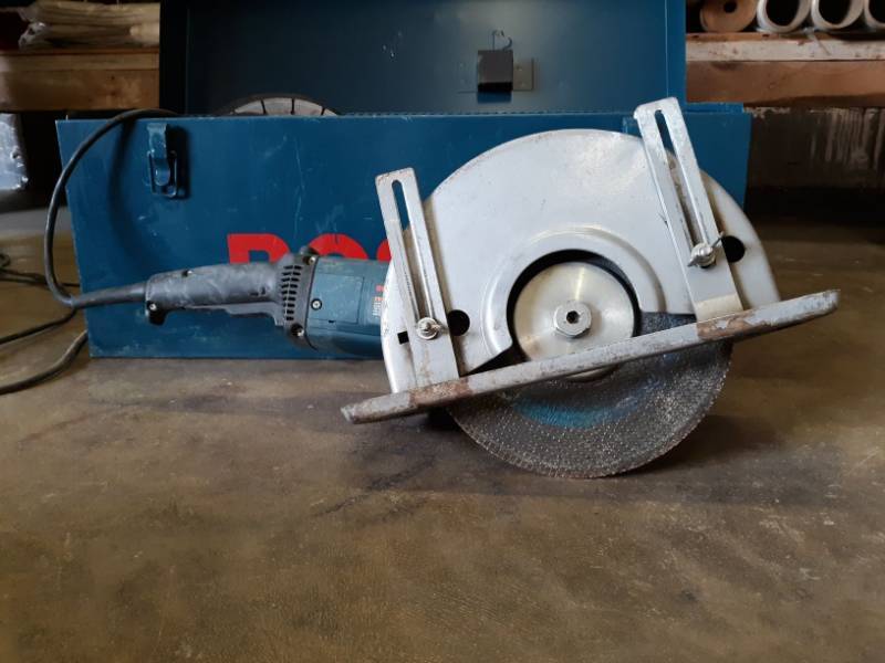 lot 9979 image: Bosch Hand Held Saw, Cuts Concrete And Metal