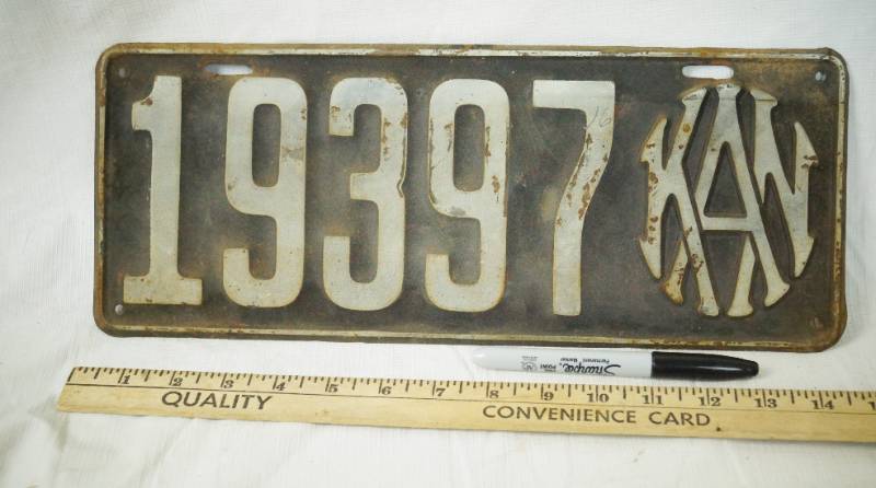 lot 1393 image: Vintage Metal  License Plate - Very Heavy and Old Very Cool