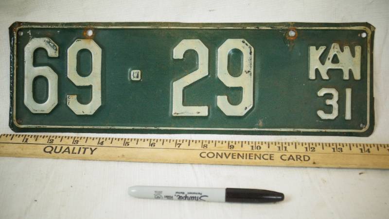 lot 1408 image: Vintage Heavy 1931 Kansas License Plate -  Very Cool Find