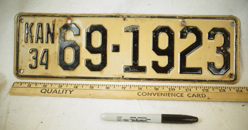 lot 1411 image: Vintage Heavy 1934 Kansas License Plate -  Very Cool Find