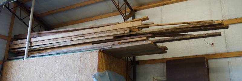 lot 4055 image: Lot of wood - Mostly 2 x 4s Over loft - bring help to remove from loft