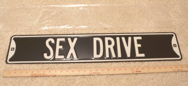 lot 3133 image: Metal Embossed Street Sign - SEX DRIVE NEW
