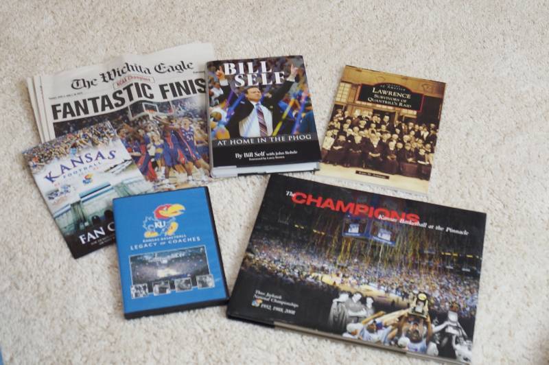 lot 3167 image: Lot of KU Kansas University Collectibles - Books, DVD, Championship Wichita Eagle Newspaper and More