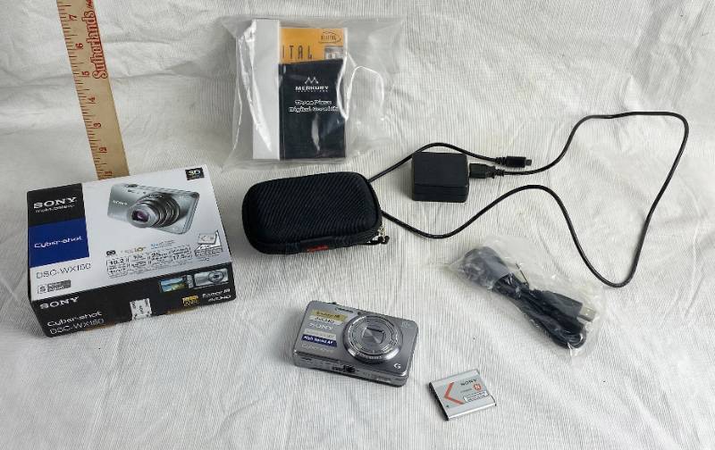 lot 3378 image: SONY Cybershot Digital Camera with Case and Charger w original box