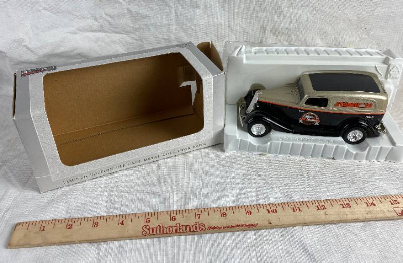 lot 3390 image: STURGIS 1998 ERTL Collectible - 1934 Ford Delivery Sedan  - MB & Strings Inc. Die Cast Metal Bank - new in orig box