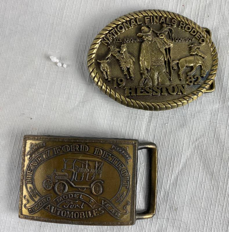 lot 3415 image: Lot of 2 Belt Buckles - Hesston National Rodeo 1982 & Henry Ford Detroit Record Year - WOW see pics for details
