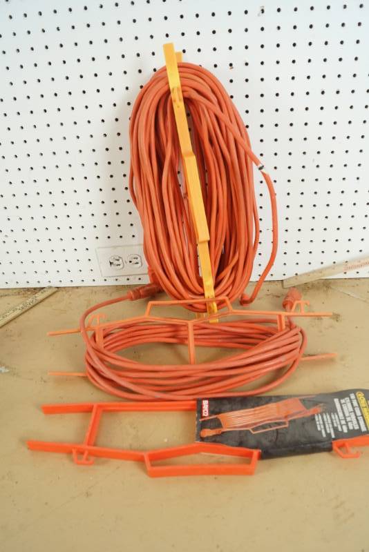 lot 1575 image: Lot of Orange Extension Cords and Storage Holders