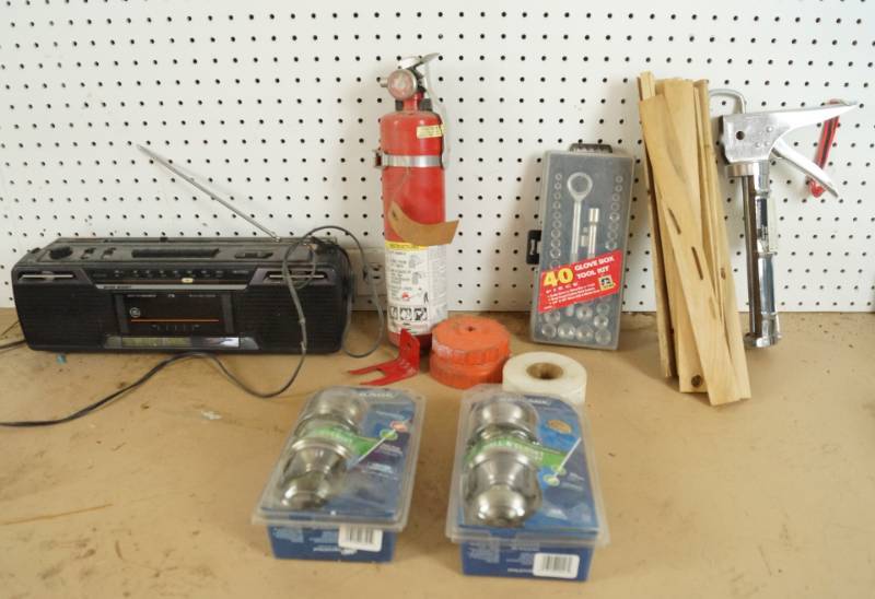 lot 1574 image: Lot of Garage Items - Caulking Gun, Door Knobs, Socket Set, Shop Radio and More - see pics