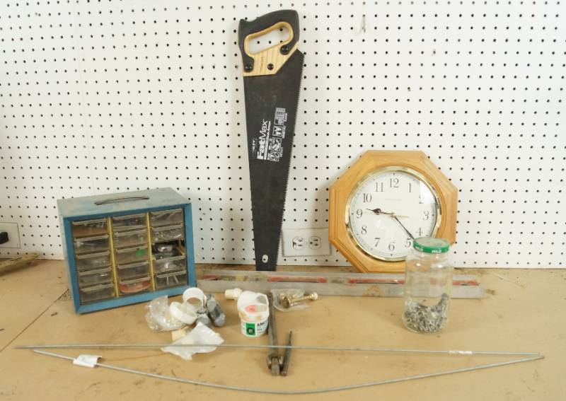 lot 1573 image: Lot of Garage Items - Hardware and Storage Bin, Newer Hand Saw, clock, level and cleaning spring - see pics