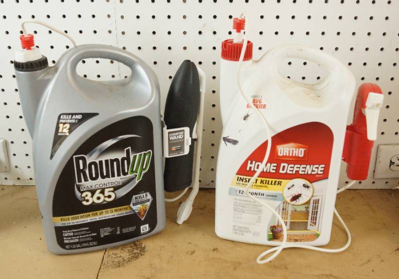 lot 1560 image: Lot of Round Up and Home Defense Insect Killer - see lines on containers for approx. fill