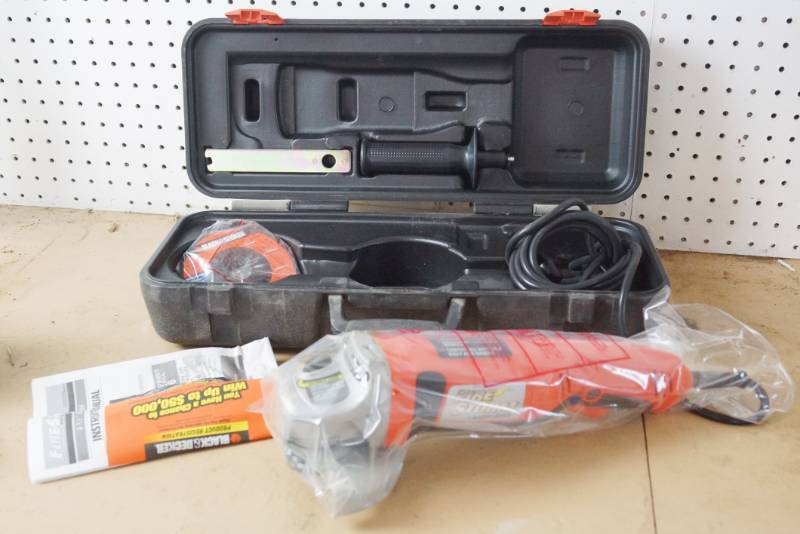 lot 1528 image: Angle Grinder 4-12 - Black & Decker Firestorm -  NEW in case w manuals (outside of case is dusty from storage)