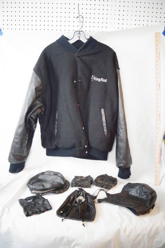 lot 1506 image: Leather Varsity Style Riding Jacket (large) and other leather accessories - HATS, PURSES and gloves - cool