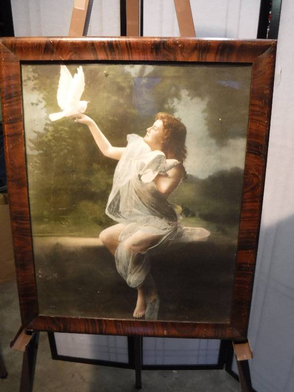 lot 7276 image: Lady with a dove nice wall art in a beautiful wood frame