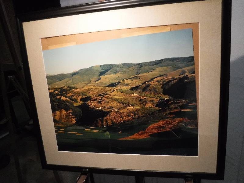 lot 7296 image: Framed and matted picture of a village by the sea- signed