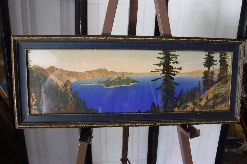 lot 7346 image: Framed poster of an island in a lake
